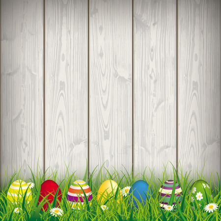 Green grass with colored easter eggs on the wooden background. Eps 10 vector file.のイラスト素材