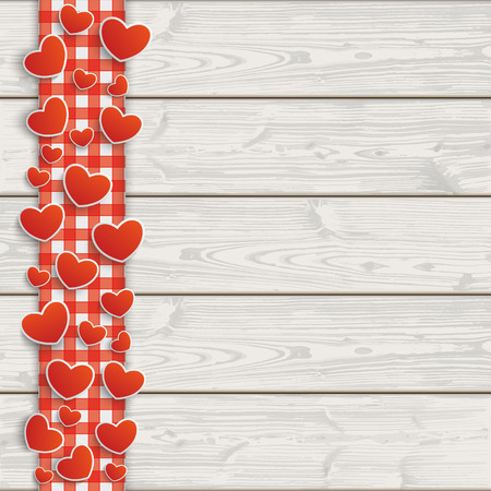 Red checked tablecloth with hearts on the wooden background.のイラスト素材