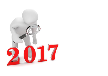 White cartoon character with loupe and year 2017. 3d Illustration.の写真素材