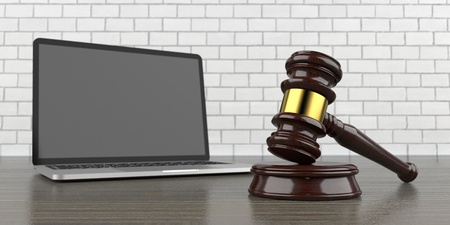 Auction gavel with a notebook on the wooden table. 3d illustration.の写真素材