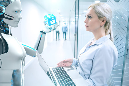 A humanoid robot explains the company's IT security to the businesswoman.
