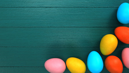Colored Easter eggs on the green table. 3d illustration.