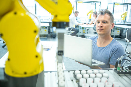 An engineer developing the industrial robot.