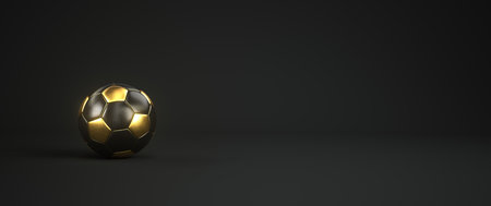 Golden football on a black background. 3d illustration.の写真素材