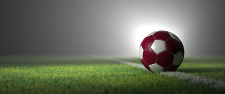 Football in Qatar national colors on the ground. 3d illustration.の写真素材