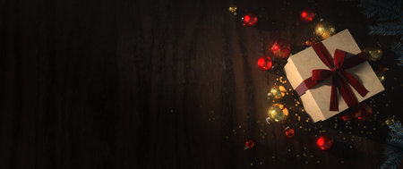 A Christmas banner, with gifts and baubles on the wooden table. 3d illustration.の写真素材