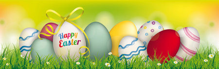 Colored Easter eggs in the meadow. Eps 10 vector file.のイラスト素材