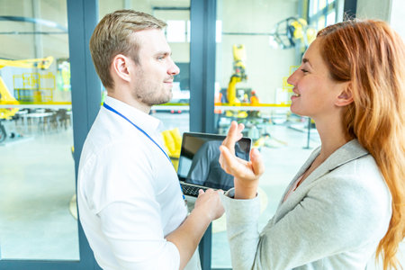 Engineers developing AI for industrial robots.の写真素材