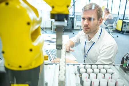 An engineer developing the industrial robot.の写真素材