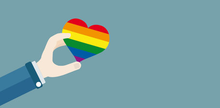 A human hand with a rainbow heart. Eps 10 vector file.のイラスト素材