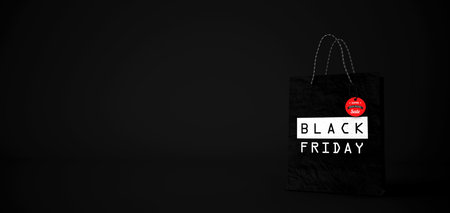 Black friday shopping bag on the black background. 3d illustration.の写真素材