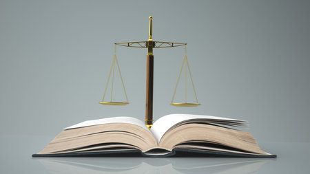 Golden scale with an open book. 3d illustration.の写真素材