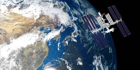 Extremely detailed and realistic high resolution 3D illustration of International Space Station ISS orbiting Earth. Shot from Space.の写真素材