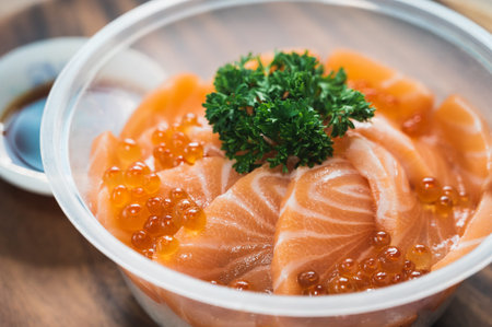 Salmon don. Salmon rice with salmon roe in a plastic bowl. Japanese food.の写真素材