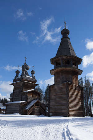 winter snow shot of russian wooden traditional orthodox church and chapel in the nrthern open air museum Malye Korely near Arkhanglesk, Primorsk Region, Russiaのeditorial素材