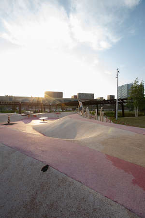 Moscow, Russia - 08.08.2021. Children playground with skate cradle bowl, in-ground trampolines, slide, tubes. Tyufeleva Roshcha city park, Zilart. ! melk landscape architecture urban designのeditorial素材