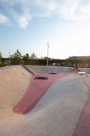 Moscow, Russia - 08.08.2021. Children playground with skate cradle bowl, in-ground trampolines, slide, tubes. Tyufeleva Roshcha city park, Zilart. ! melk landscape architecture urban designのeditorial素材