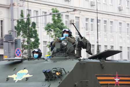 Moscow, Russia - 18.06.2020 Victory Day Parade rehearsal. Tankman soldier on a gun turret of a...