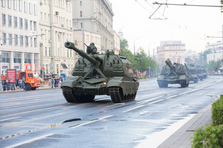 Moscow, Russia - 06/18/2020 Victory Day Parade rehearsal on Sadovaya street (Garden Ring). 2S35 Koalitsiya-SV Russian ground forces army self-propelled gun on mounted on T-90 tankのeditorial素材