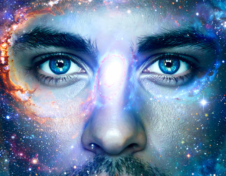 Spiritual man with blue eye and face in double exposure of cosmos. concept of universe, galaxy, star, consciousness, meditation, and mindの素材