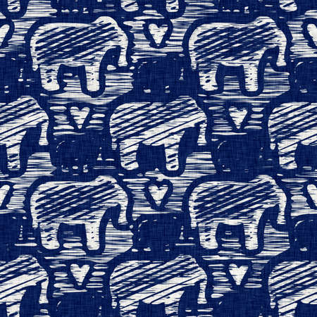 Indigo dyed fabric elephant animal pattern texture. Seamless textile fashion cloth dye resist all over print. Japanese kimono block print. High resolution batik effect repeatable nature swatch.の写真素材
