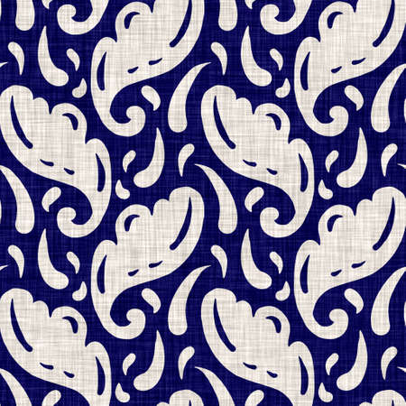 Indigo blue foliage block print dyed linen texture background. Seamless woven japanese repeat batik pattern swatch. Floral organic distressed blur block print all over textile.の写真素材