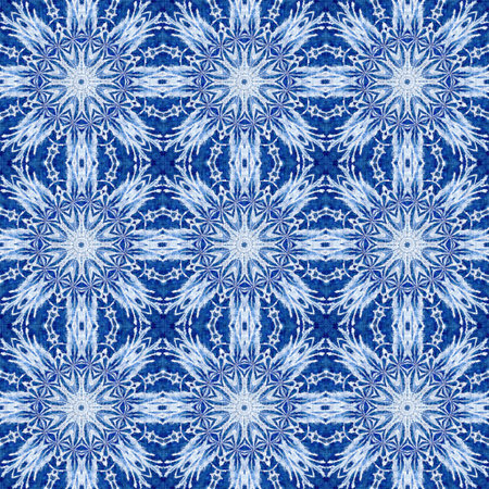 Indigo blue snow flake damask pattern background. Frosty painterly effect seamless backdrop. Festive...