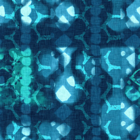 Abstract indigo blue batik dye seamless pattern, Organic bleed effect dyed wash background.の写真素材