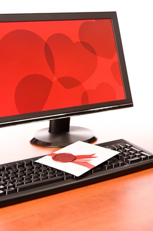 Love-letter on computer keyboard on white backgroundの写真素材