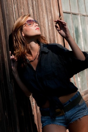 Attractive young woman enjoying sun in the afternoonの写真素材
