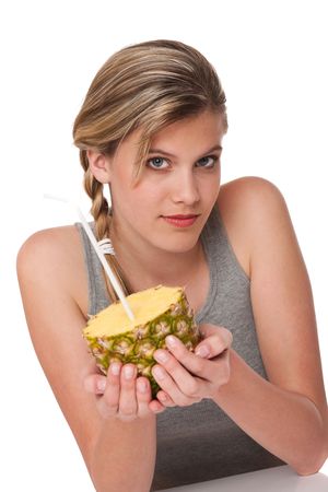 Woman holding pineapple on white backgroundの写真素材
