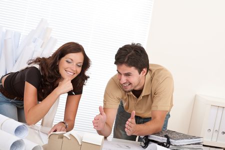 Man and woman at architect office working togetherの写真素材