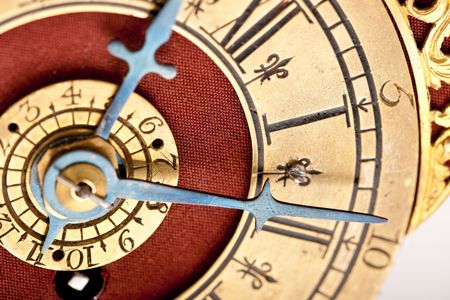 Detail of antique gold and red clock with Roman numeral, macro lensの写真素材