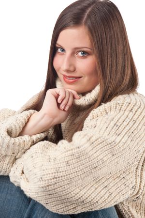 Portrait of beautiful young woman wearing turtleneck on white backgroundの写真素材