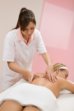 Body care - woman back massage in day spaの写真素材