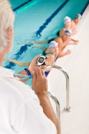 Swimming pool - swimmer training competition in class with coachの写真素材