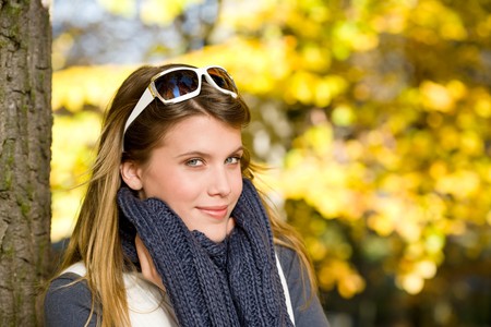 Autumn park - fashion model woman on sunny dayの写真素材