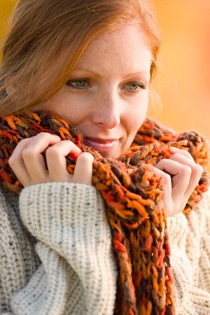 Autumn country sunset - portrait of long red hair womanの写真素材