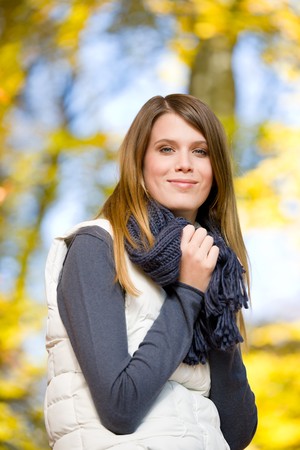 Autumn park - fashion model woman on sunny dayの写真素材