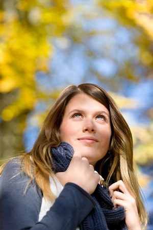 Autumn park - fashion model woman on sunny dayの写真素材
