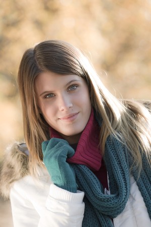 Winter fashion - woman with gloves outside, desaturated colorsの写真素材