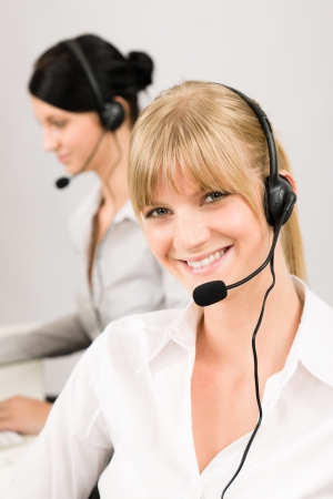 Customer service team woman call center smiling operator phone headsetの写真素材