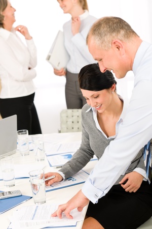 Sales meeting business people review reports consulting new strategyの写真素材