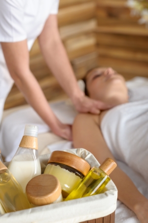 Beauty spa products in massage room woman enjoy treatmentの写真素材