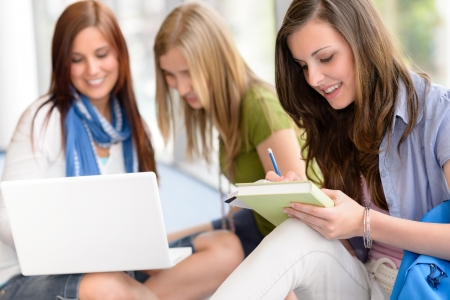 Group of high school students sitting floor self educatingの写真素材