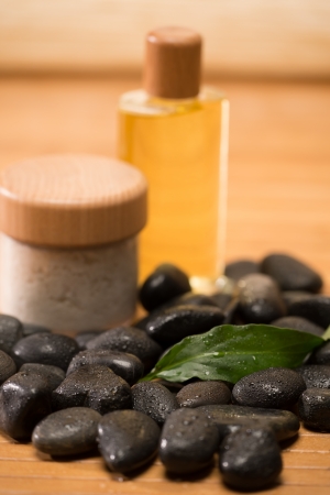 Spa zen stones with salt and oil still nature settingの写真素材