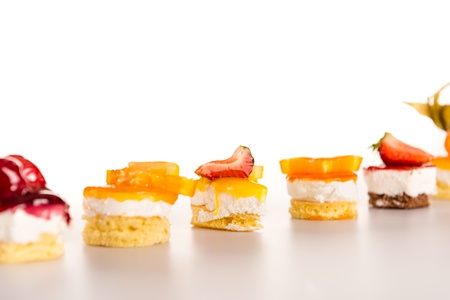Selection of mini desserts creamy fruit choice sweet tarts petiteの写真素材