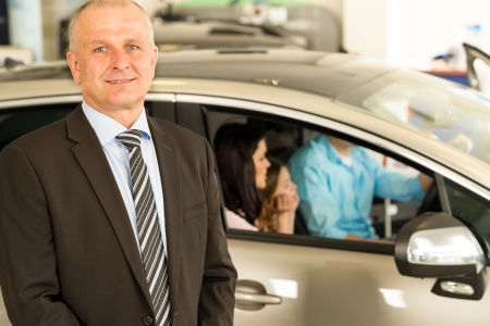 Closeup portrait of car dealer looking at cameraの写真素材