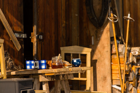 Table with tea and fruit bread outside winter cottage