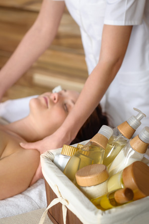 Beauty spa products in massage room woman enjoy treatmentの写真素材
